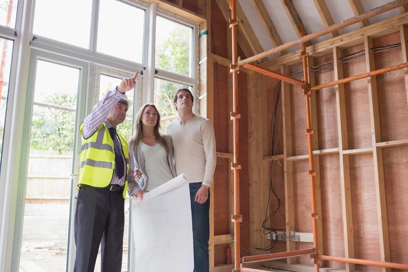 Professional structural engineer inspecting fire damage